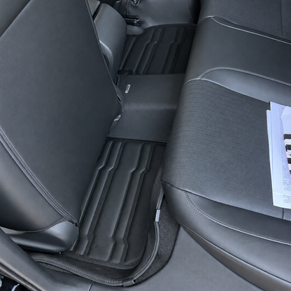 Mat Up! custom-fit all-weather floor mats installed in a vehicle footwell