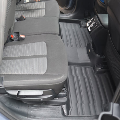 Mat Up! custom-fit all-weather floor mats installed in a vehicle footwell