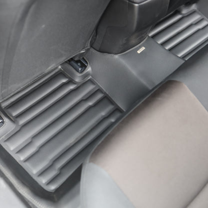 Mat Up! custom-fit all-weather floor mats installed in a vehicle footwell