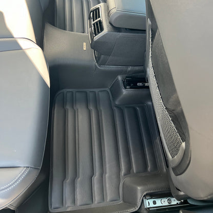 Mat Up! custom-fit all-weather floor mats installed in a vehicle footwell