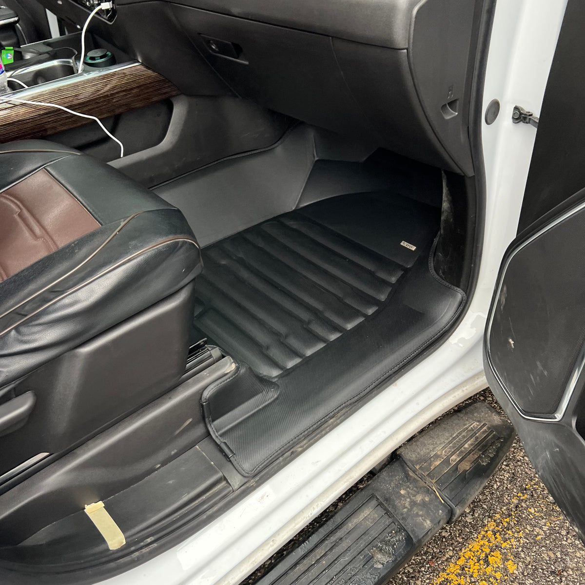 GMC custom-fit all-weather floor mats by Mat Up!, installed